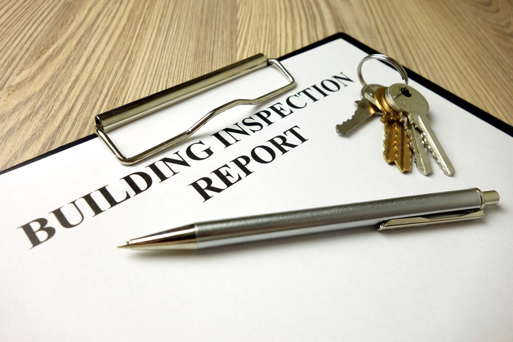 Building Inspection Report With Pen And Keys, Real Estate Concept